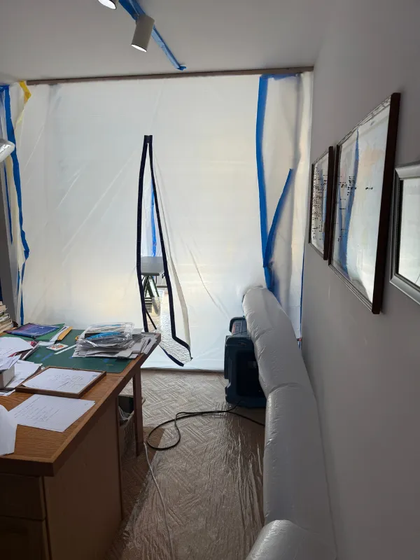 Office contents moved and sheeting hung so the room can be dried