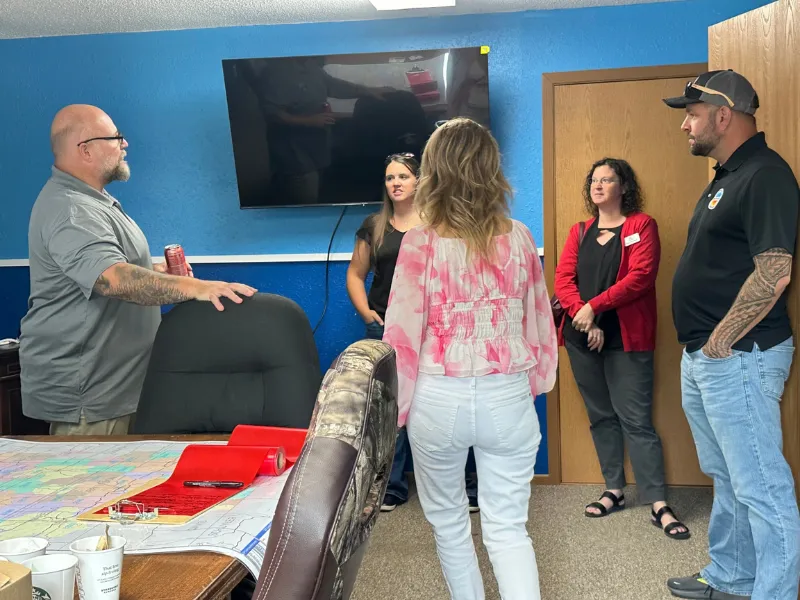 Staff and guests at the office open house